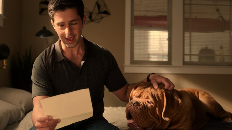 Turner petting Hooch