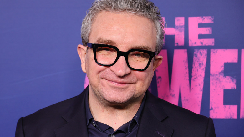 Eddie Marsan wearing thick-rimmed glasses