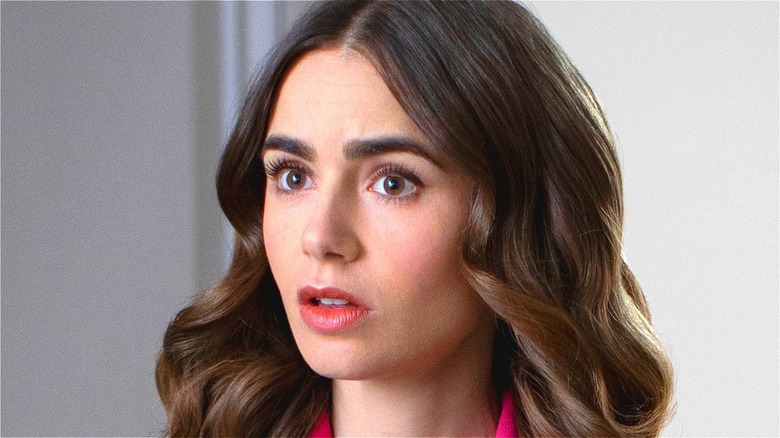 Lily Collins looking concerned