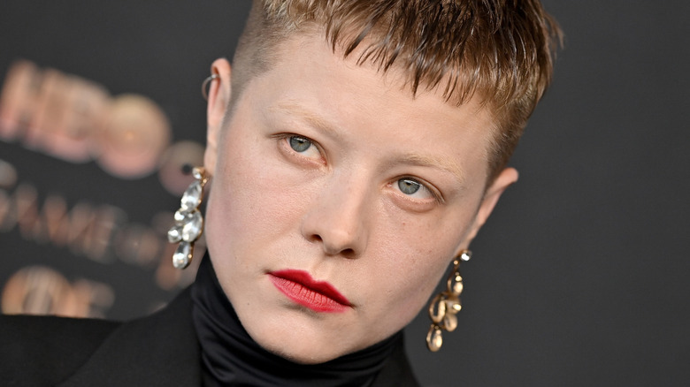 Emma D'Arcy wearing hair short