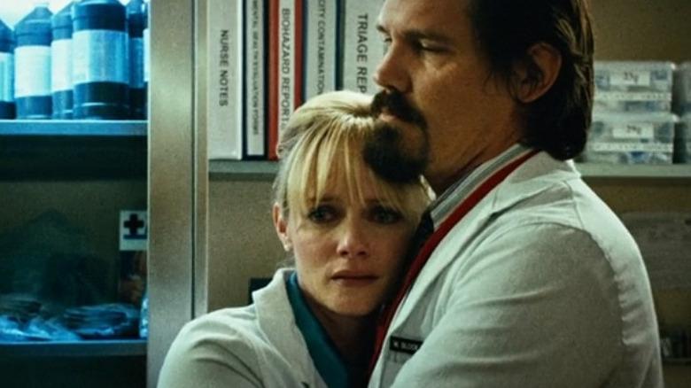 William hugs Dakota white coats