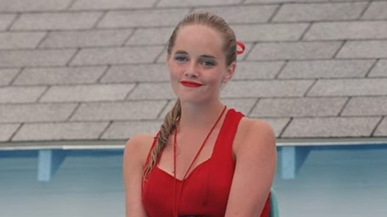 Wendy Peffercorn smiling red swimsuit