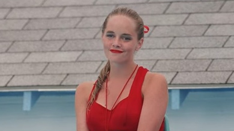 Wendy Peffercorn smiling red swimsuit