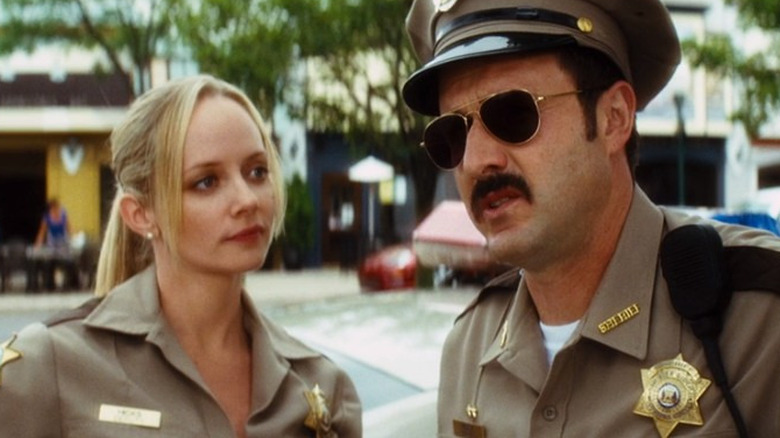 Judy listens to Dewey sunglasses