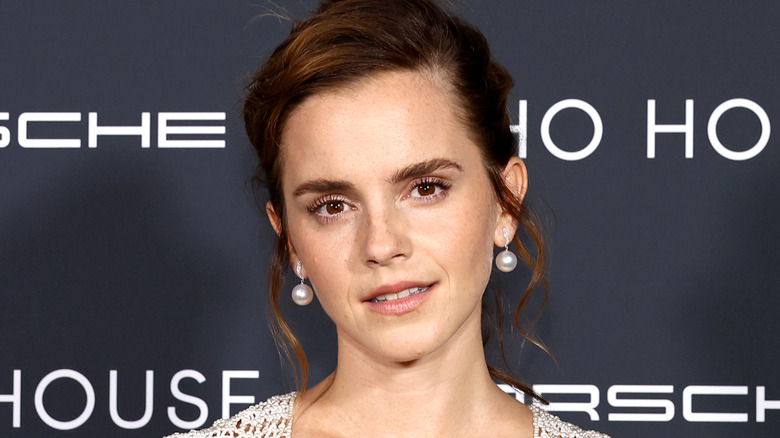 Emma Watson poses at a Porsche event