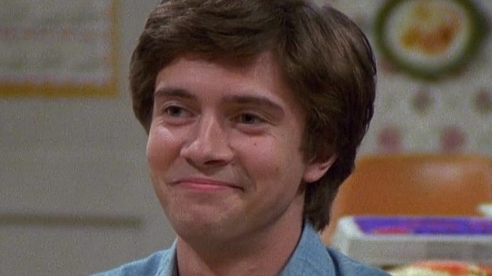 Eric Forman with a self-satisfied grin