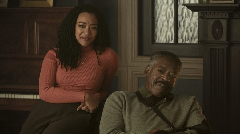 Lena and Reverend Peters smile together in "Boston Blue" (2025-present)