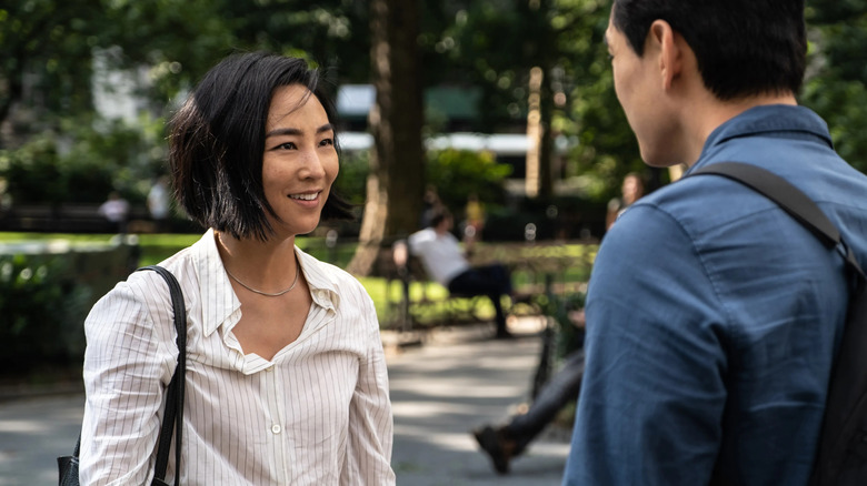 Nora talking to Hae Sung in New York in a park in Past Lives
