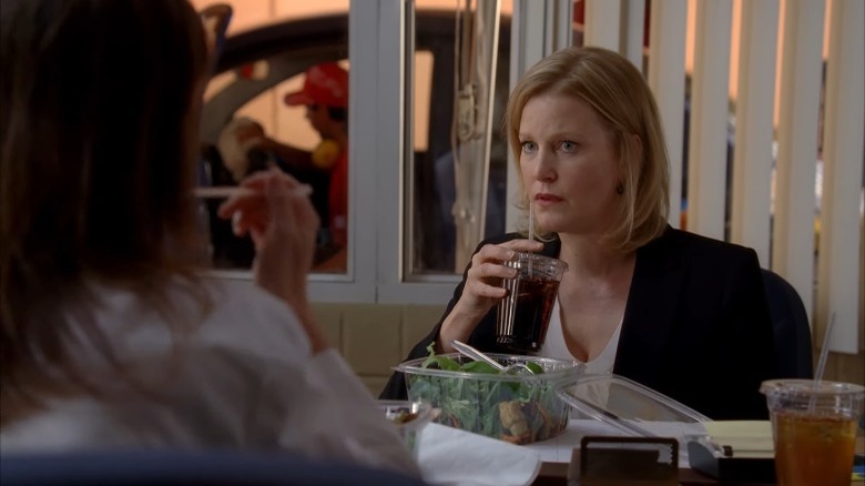 Skyler White eats lunch in her office