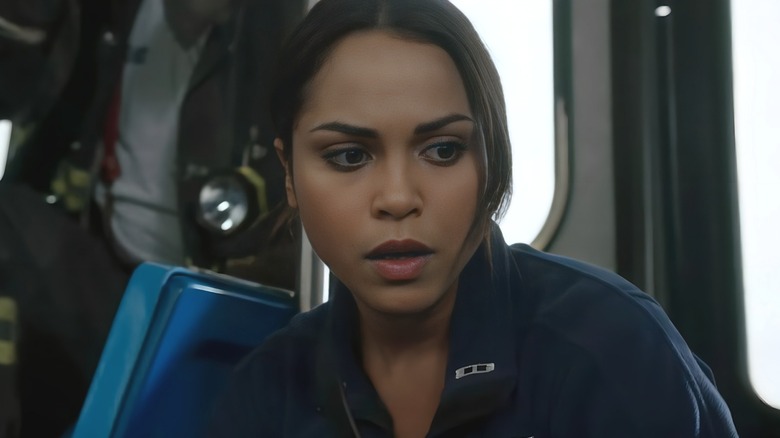 Gabby Dawson riding in an ambulance