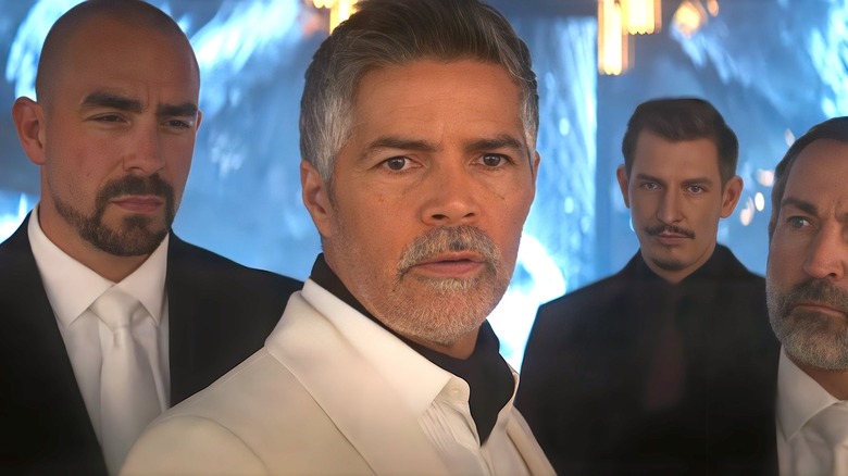 Gabriel wearing white suit