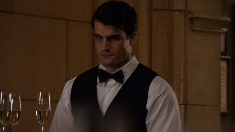Bartender frowning 
