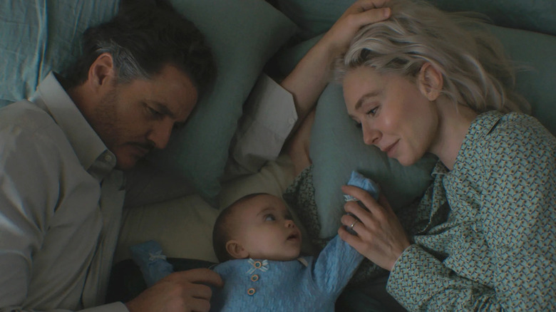 Reed and Sue in bed with Franklin in 