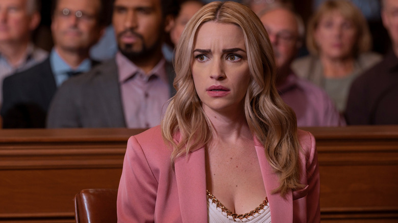 Georgia sits shocked in a courtroom in "Ginny and Georgia" (2021-present)