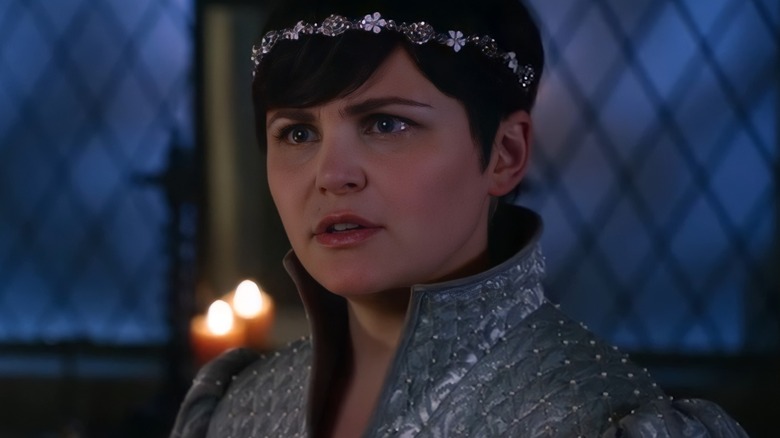 Snow tries to warn Charming 