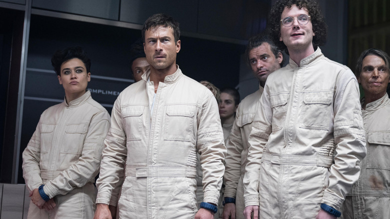 Ben Richards and other game show contestants in "The Running Man" (2025)