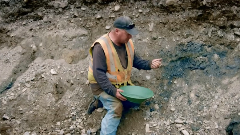 Freddy Dodge sifting for gold