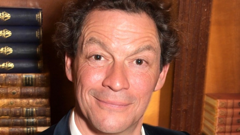 Dominic West smiling for the camera