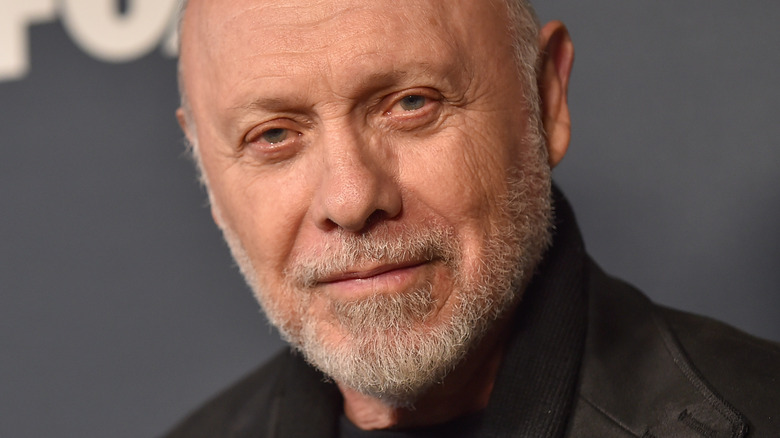 Hector Elizondo smiles