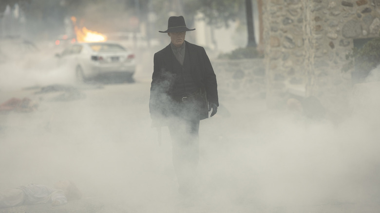 William walking through smoke