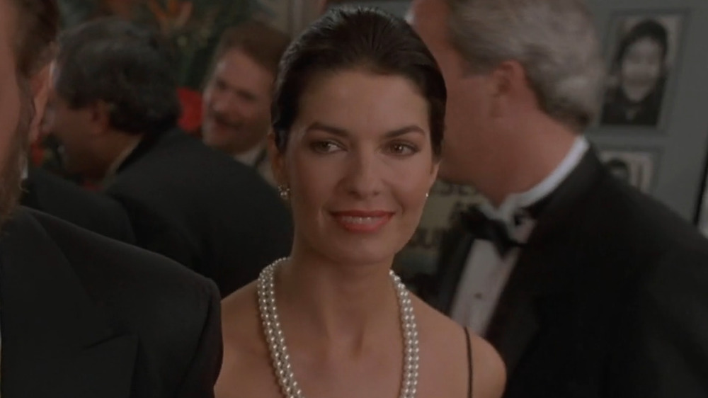 Sela Ward in pearl necklace