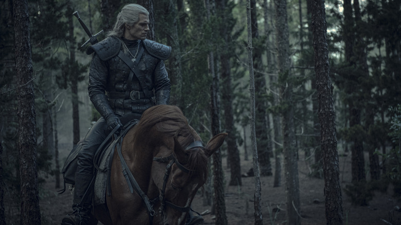 Henry Cavill riding a horse