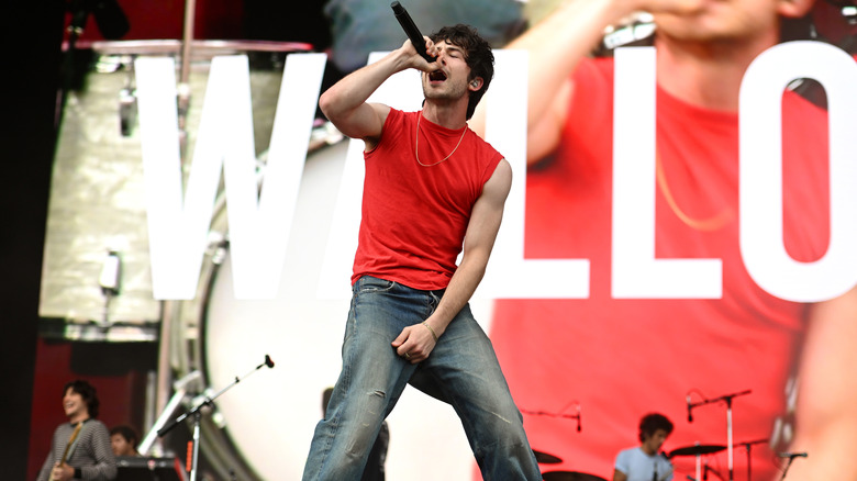 Dylan Minnette performing with Wallows