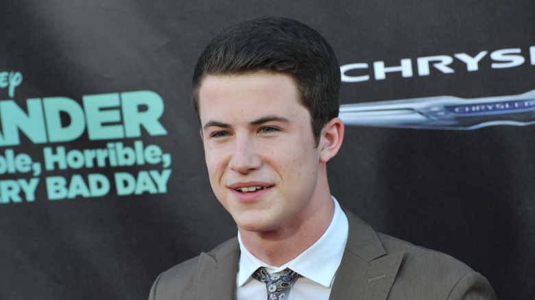 Dylan Minnette wearing a suit