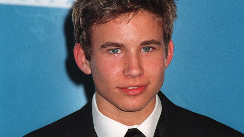 Jonathan Taylor Thomas blue background