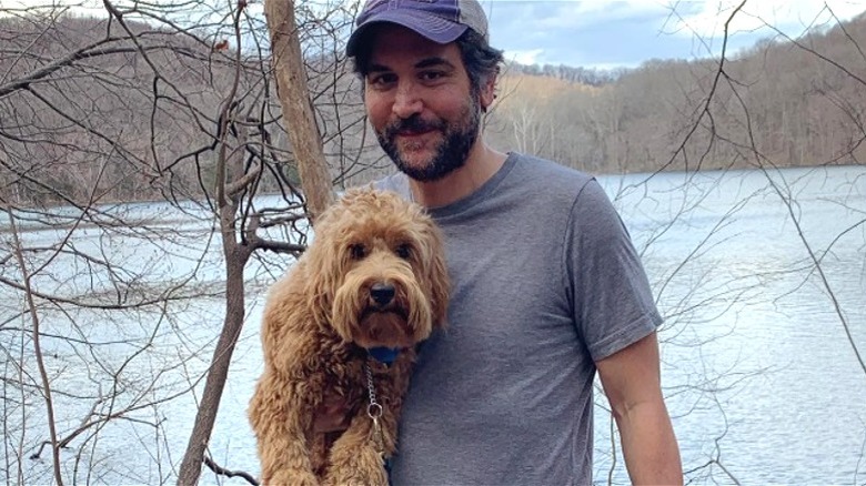 Josh Radnor posing with his dog Nelson