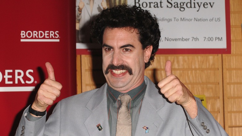 Borat smiling with thumbs up