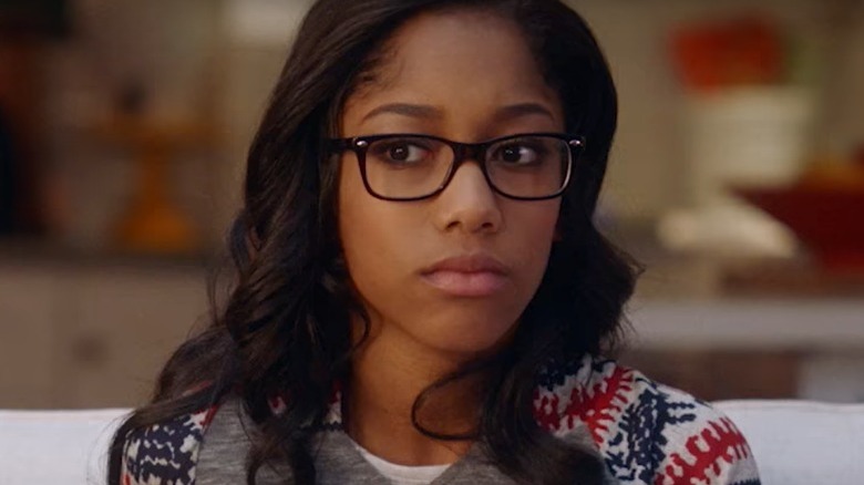 Tia staring at Buck