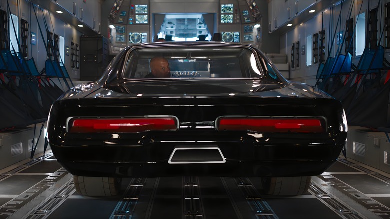 Dominic Toretto backing up car 