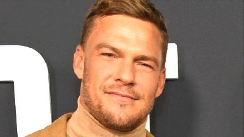 alan ritchson smirking