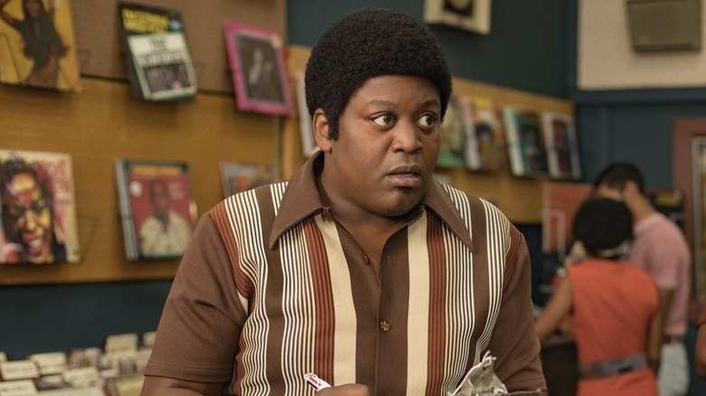 Theodore Toney holding clipboard