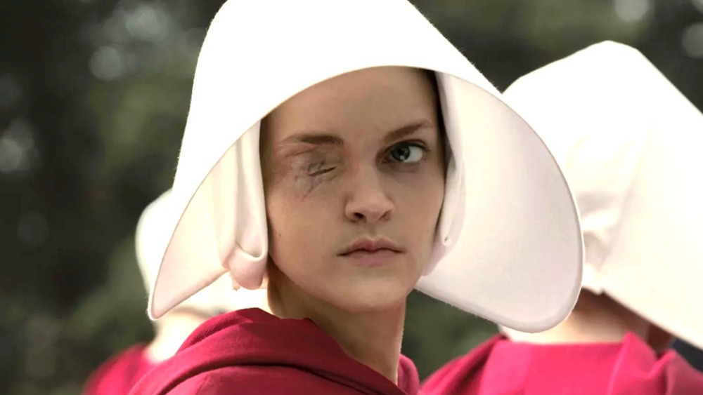 Janine in handmaid's outfit