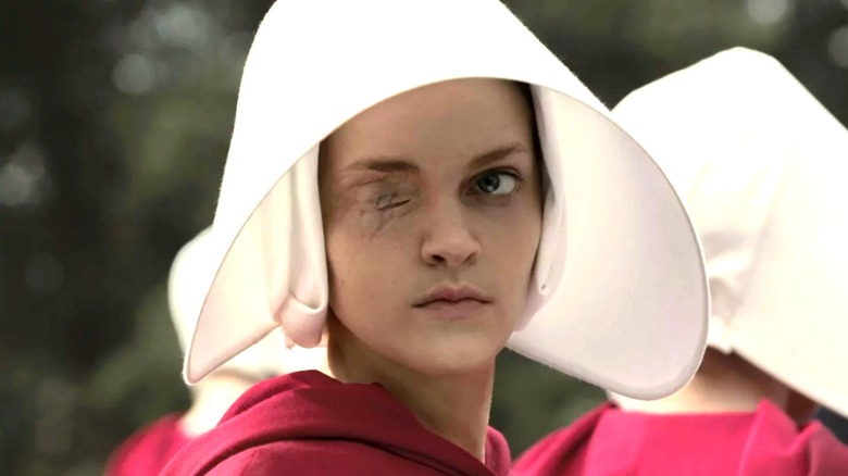 Janine in handmaid's outfit