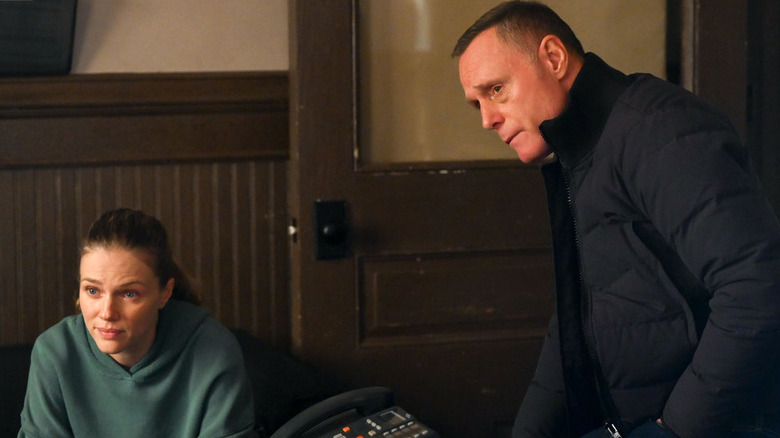 Upton and Voight looking at something