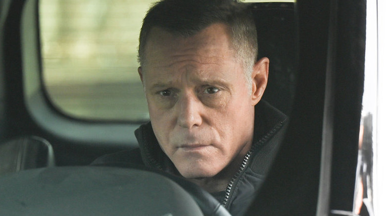Voight sitting in a car