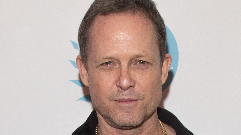 Dean Winters looking at the camera