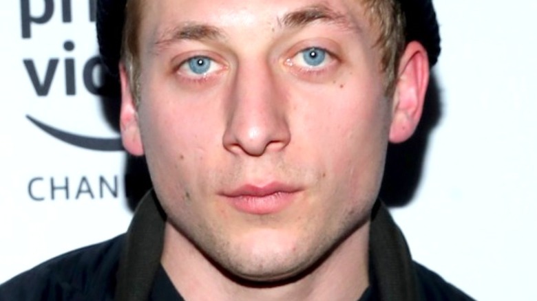 Jeremy Allen White looking on