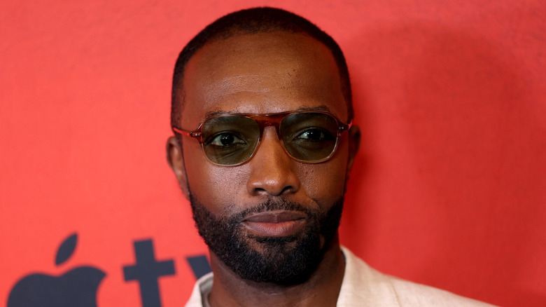 Jamie Hector wearing sunglasses