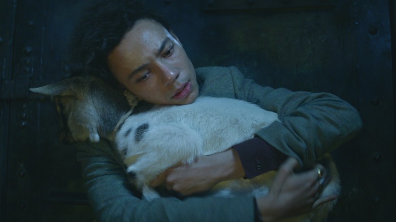 Jesper hugs a goat