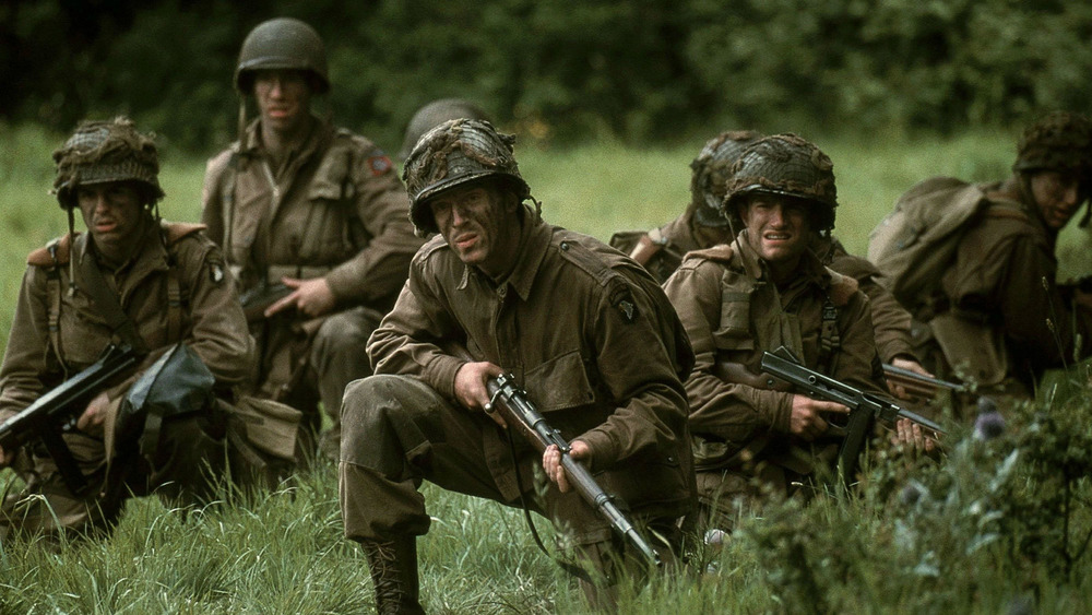 Lt. Winters and other soldiers in camouflage with weapons WWII