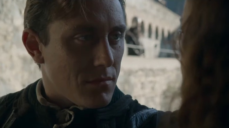 Riario looking conspiratorial 