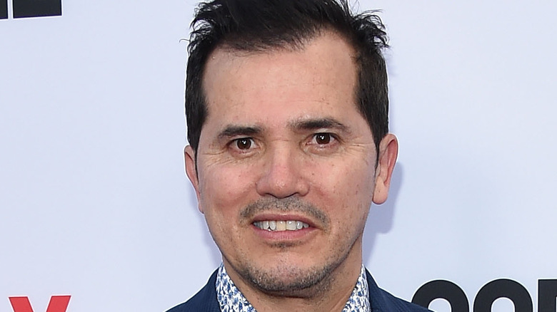 John Leguizamo smiling