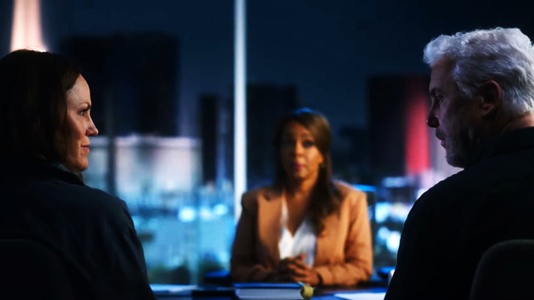 Sara and Gus looking at each other