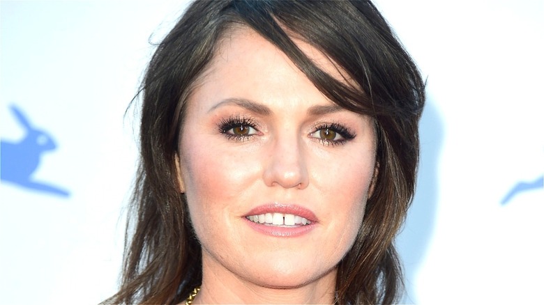 Jorja Fox posing for photographers