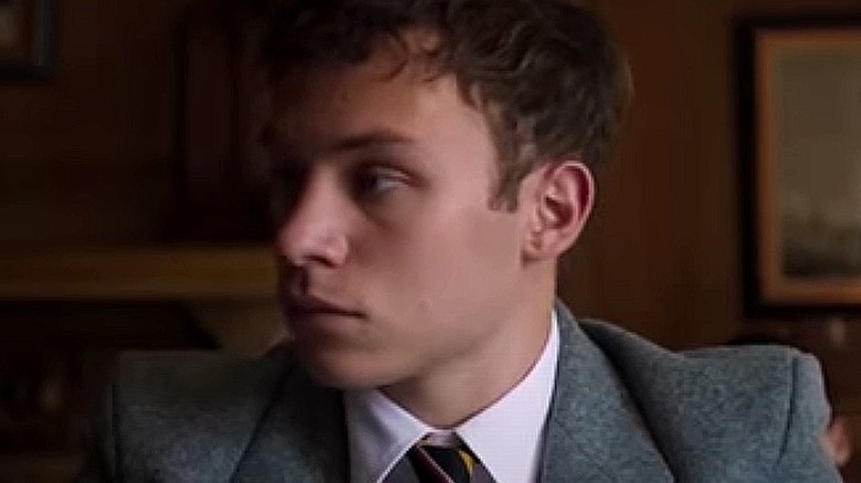 Finn Cole grey suit