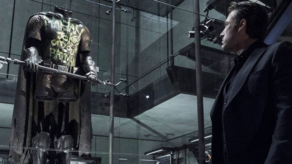 Bruce Wayne looks at Robin's old costume in Batman v Superman: Dawn of Justice